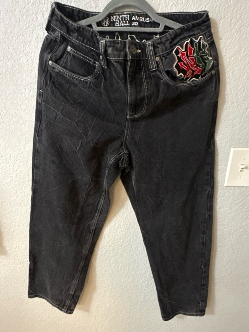 Black Relaxed Jeans with Embroidered Pocket